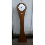 A Kienzle teak dwarf longcase clock