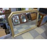 A gilt framed overmantel mirror