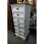 A small French style painted semanier chest of drawers