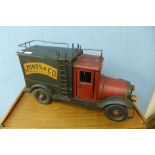 A painted wooden model of a Jones & Co. removal van