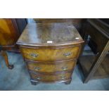 A burr walnut bow front chest of drawers