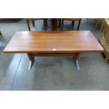 A teak and chrome coffee table