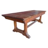 A Victorian Gothic Revival fruitwood refectory table, manner of A.W.N. Pugin, 77cms h, 244cms l,