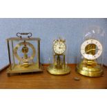 Three Kundo brass clocks