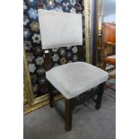A 17th Century style carved oak side chair