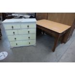 A Victorian pine chest of drawers and a Victorian pine and Formica topped kitchen table