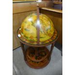 A terrestrial globe drinks trolley