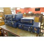 A set of four Globetrotters suitcases