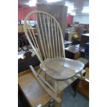 An Ercol Blonde low rocking chair, a/f