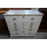 A George III painted oak chest of drawers (top adapted to lift up)