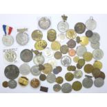 A collection of commemorative medallions, etc.
