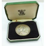 A silver Royal Mint National Trust medallion, hallmarked on the rim, to Margaret Bamber, 25g