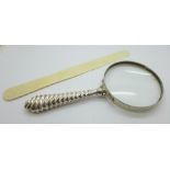 A silver magnifying glass, glass a/f and an ivory page turner