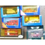 Five Corgi model vehicles including Royal Mail Post Bus and Mini Cooper, and an EFE City of