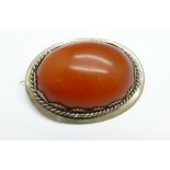 A white metal set amber brooch, mount 43mm x 32mm