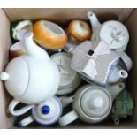 A collection of china teapots including Royal Doulton and Sadler, and four storage jars **PLEASE