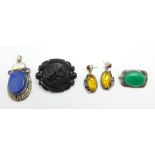 A hallmarked silver and green stone brooch, a jet brooch, a pendant and a pair of earrings