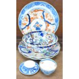 Three Imari plates, other plates and an Ironstone bowl