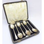 A cased set of six silver spoons, 60g