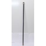 A silver topped wooden walking cane