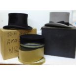 Two top hats, Dunn & Co. and Battersby & Co. and one other hat, boxed