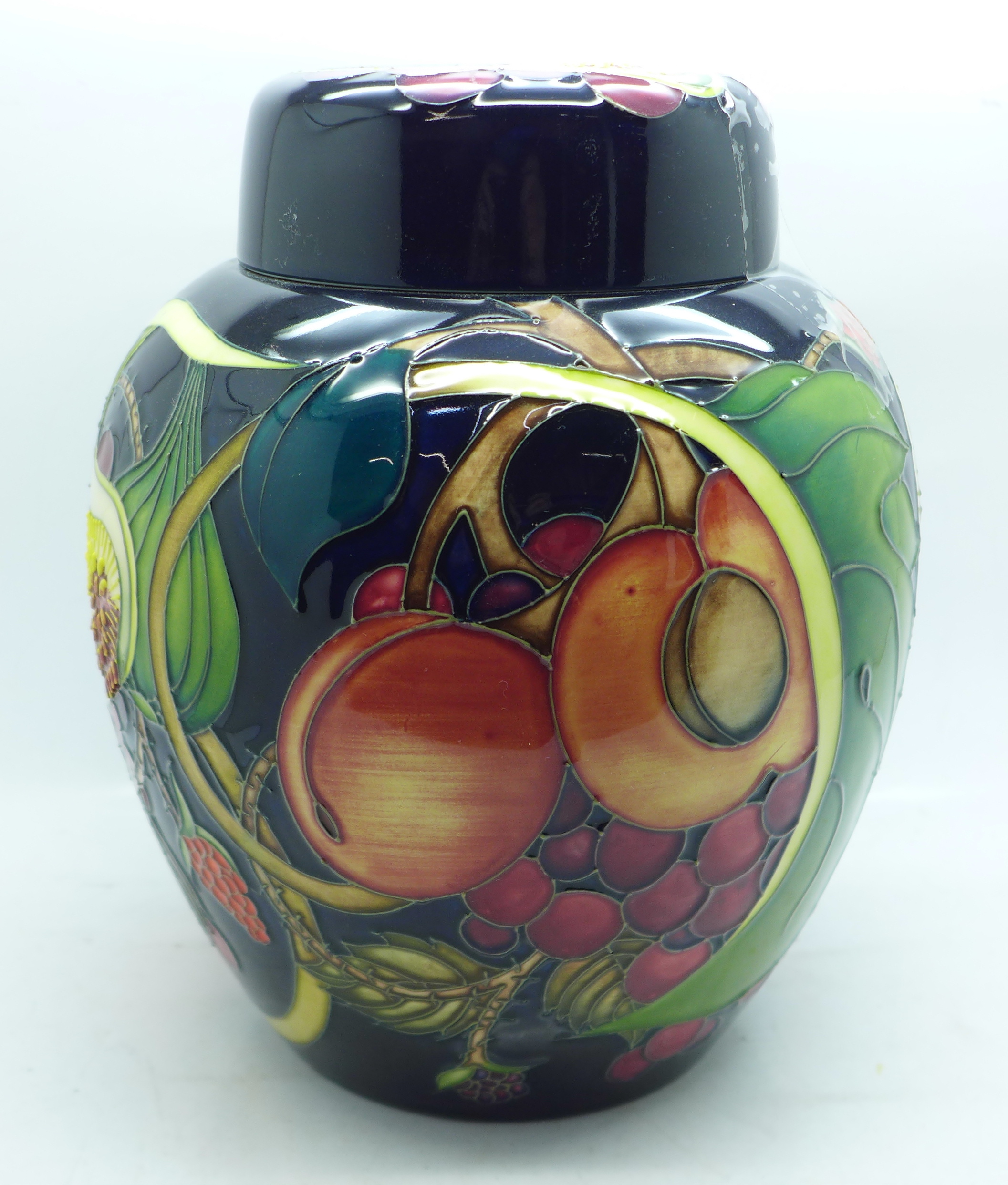 A large Moorcroft ginger jar and cover, 21cm high, in the Queen's Choice pattern, designed by Emma