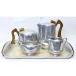 A Picquot ware four piece tea service and tray