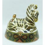 A Royal Crown Derby zebra paperweight with gold stopper, boxed