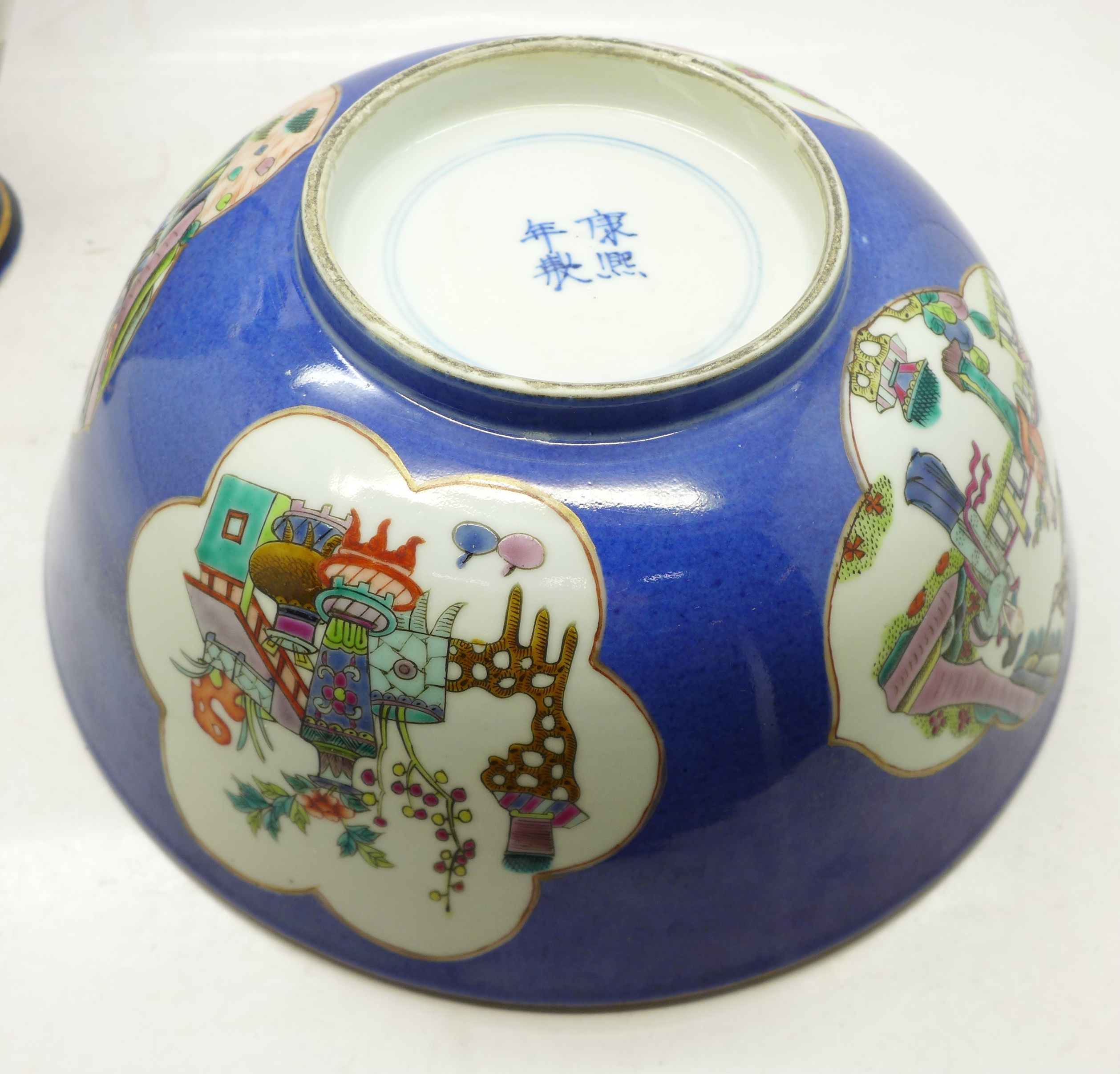 A Chinese blue ground famille rose hand painted porcelain bowl with panels of figures, flowers and - Image 10 of 18