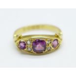 A Edwardian 18ct gold, diamond and ruby ring, Chester 1905, 2.7g, M