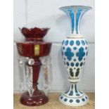 A ruby glass lustre and a continental blue and white glass vase, vase a/f