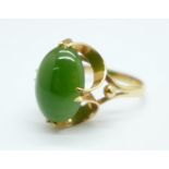 A Chinese 18ct gold and green stone ring, 4.6g, P