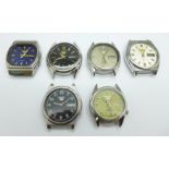 Six Seiko 5 wristwatch heads, one lacking button