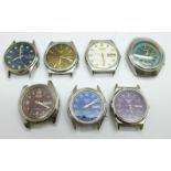 Seven Seiko 5 wristwatch heads, one lacking button