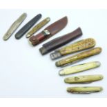 Assorted pocket knives including Holdtite advertising