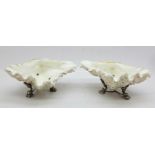 A pair of 19th Century silver plated shell salts, each 14cm wide, one metal base a/f