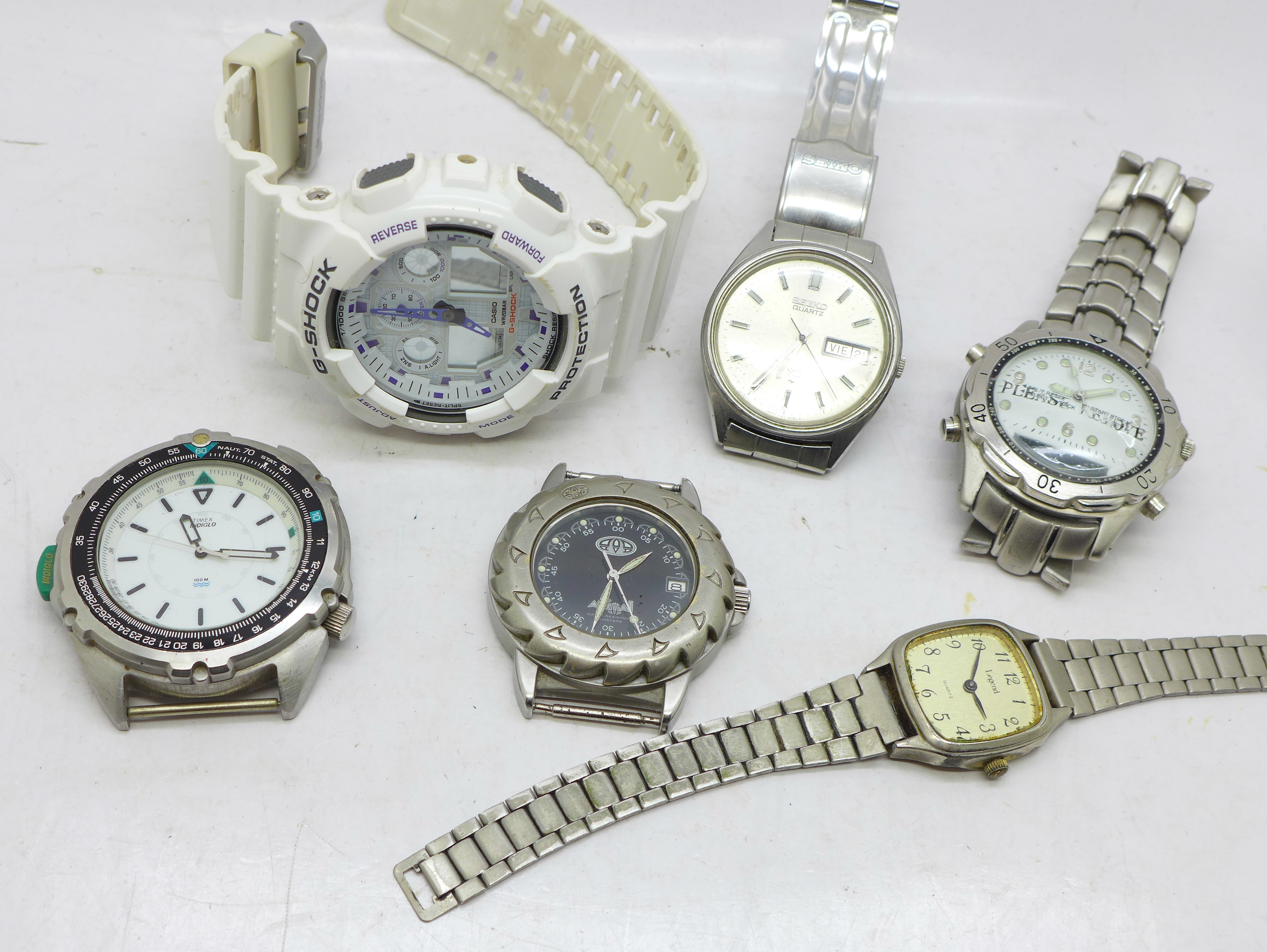 Six wristwatches including Seiko