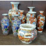 A collection of 20th Century Meiji revival period china comprising three vases decorated with