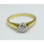 An 18ct gold and diamond solitaire ring, over 0.3carat diamond weight, 2.8g, M