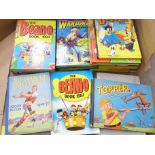 A box of books and annuals including Football for Boys 1949-50 and the Beano