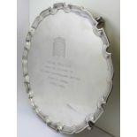 A silver tray, with inscription, 569g, 25cm