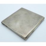 A silver cigarette case, Goldsmiths & Silversmiths, with inscription dated 1932, slide opening, 123g