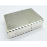 A sterling silver cased cigarette lighter