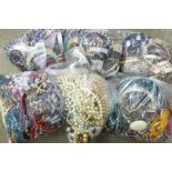 A collection of costume jewellery and bangles, (six bags)