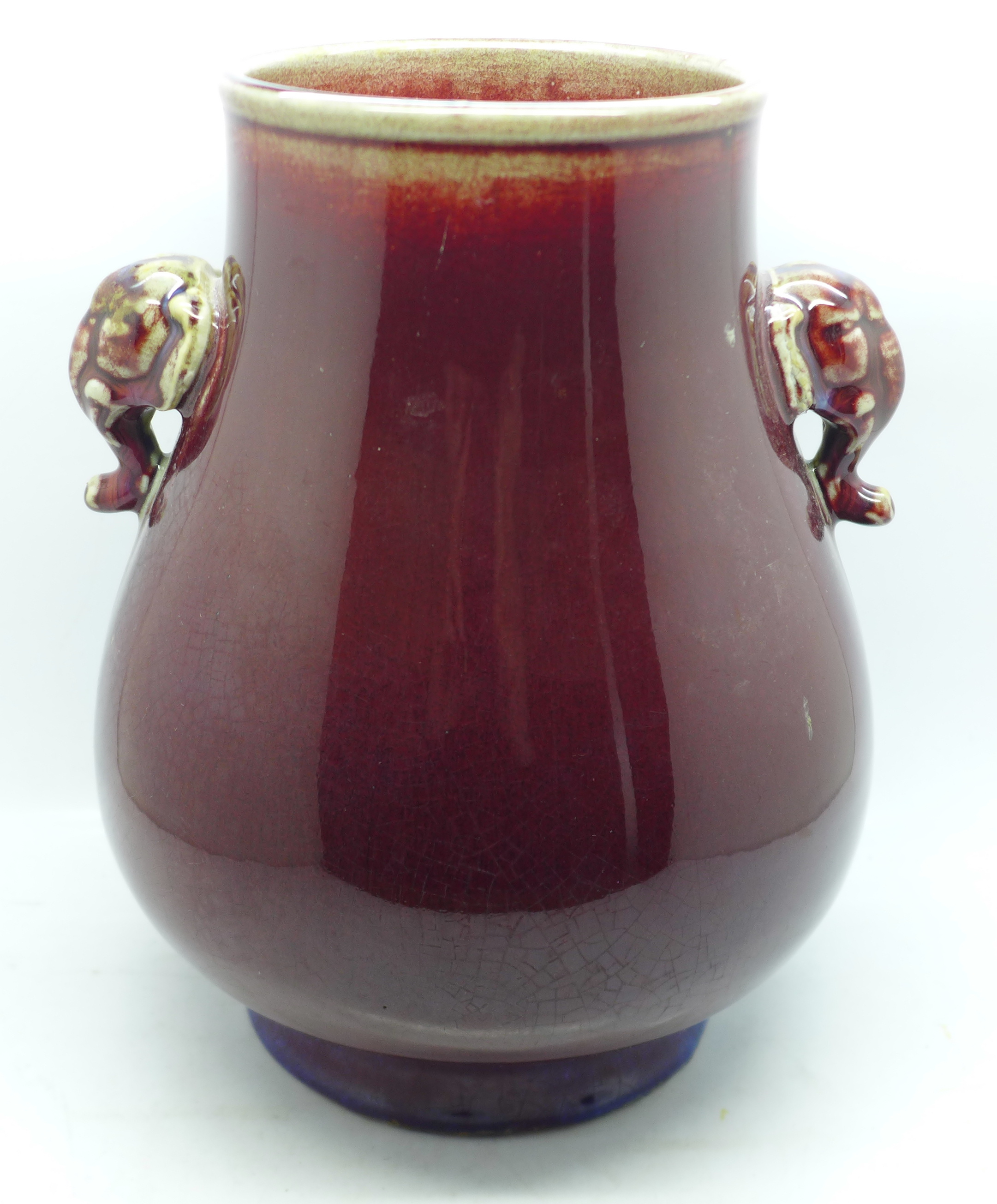 A 19th Century Chinese Sang de Boeuf Oxblood vase with Qianlong six character mark to base, 23.