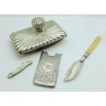 A silver card case, a silver butter knife, a silver and mother of pearl fruit knife and a