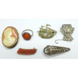 An 800 silver and coral brooch, two Art Deco clips, a marcasite set galleon brooch, a cameo