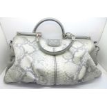 A Coach Madison Pinnacle designer handbag in python embossed leather