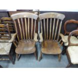 A pair of Victorian elm and beech farmhouse armchairs