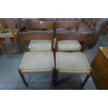 A set of four Danish teak dining chairs